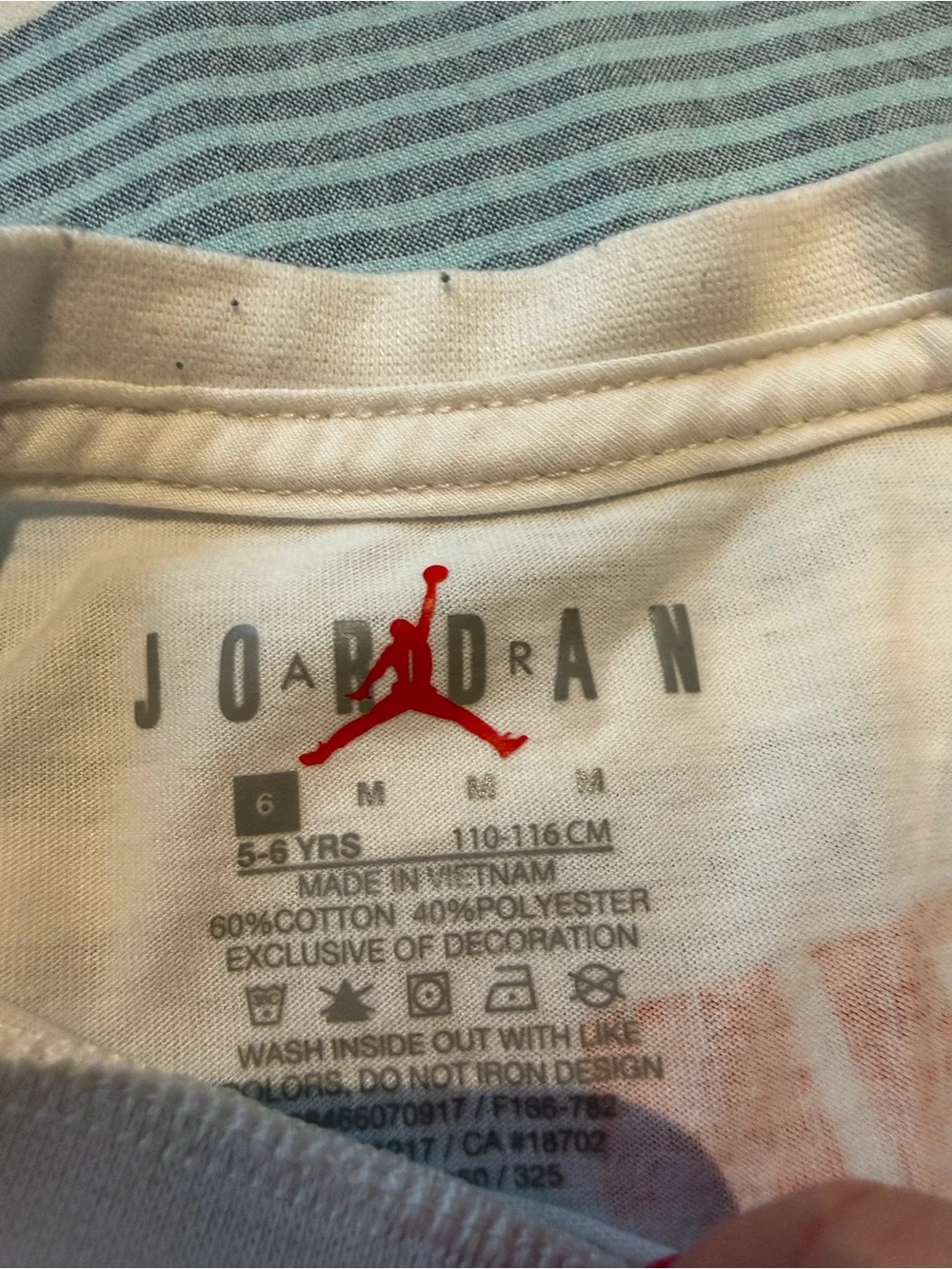 Jordan White Tee with Orange-Trim Mesh Shorts